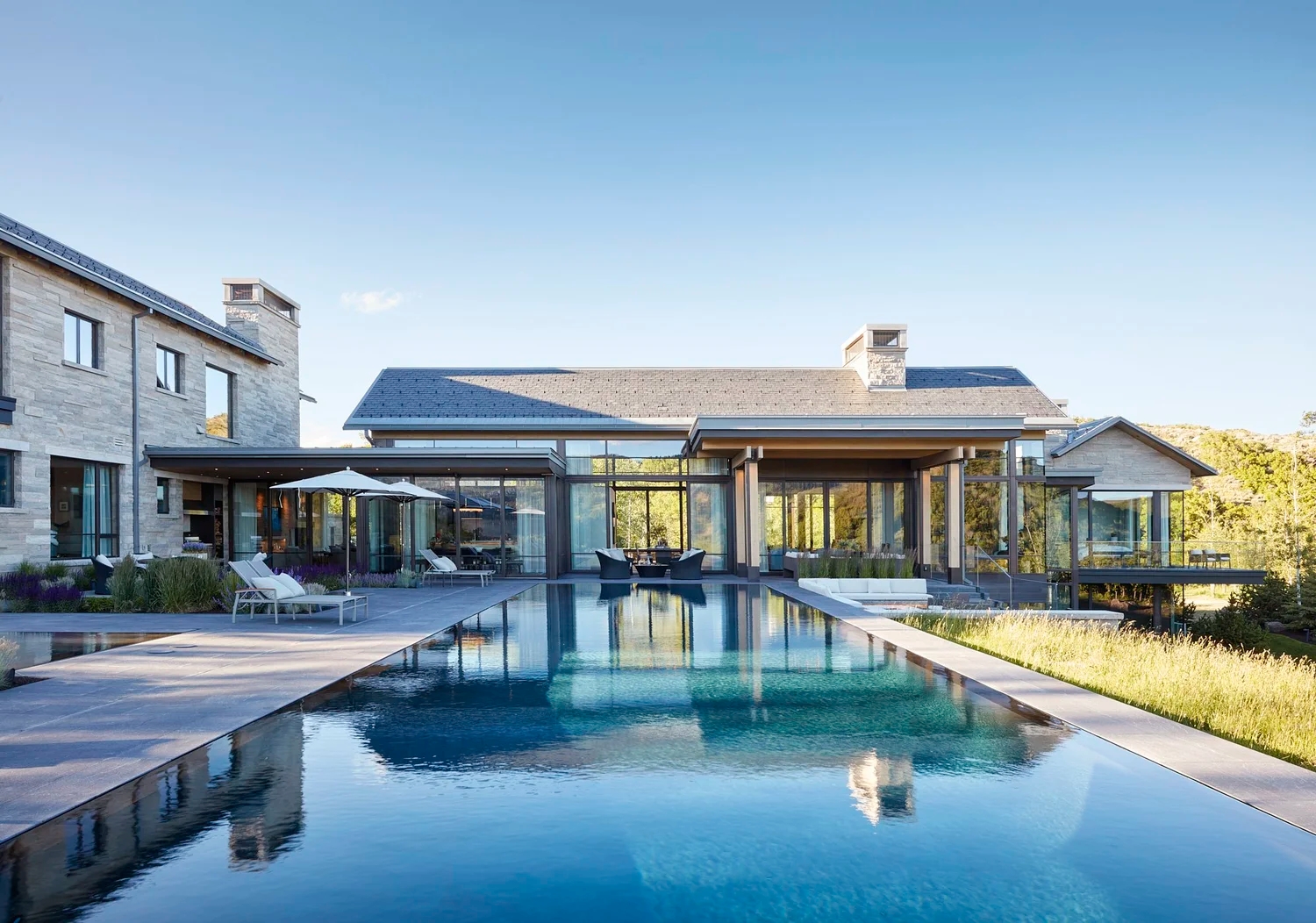 poolside view of a modern home