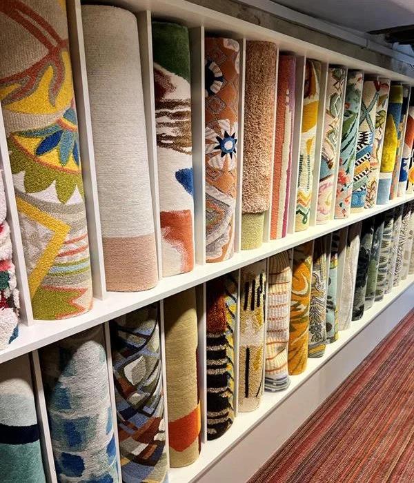 rugs displayed in a showroom