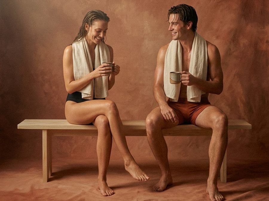 Two guests talking over tea after a session