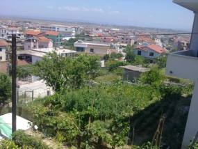 Houses and gardens of Spitallë, looking across the plain north of Durrës — xhoni_bg_dr