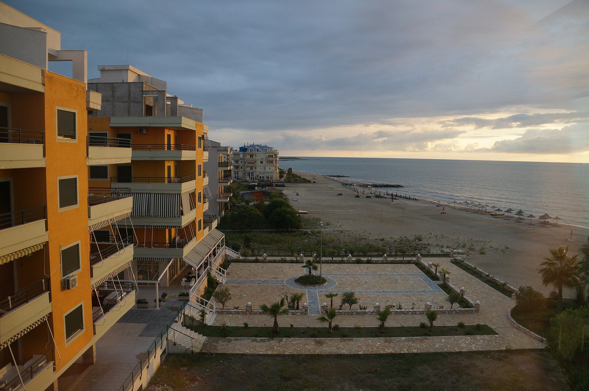 The beach at Qerret with apartment buildings on the first line, Albania — Albinfo