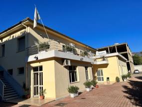 The Caritas Albania headquarters on Rruga Don Bosko, Tirana — Bdx