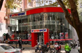 Ground-floor retail in a Tirana commercial building — Bdx
