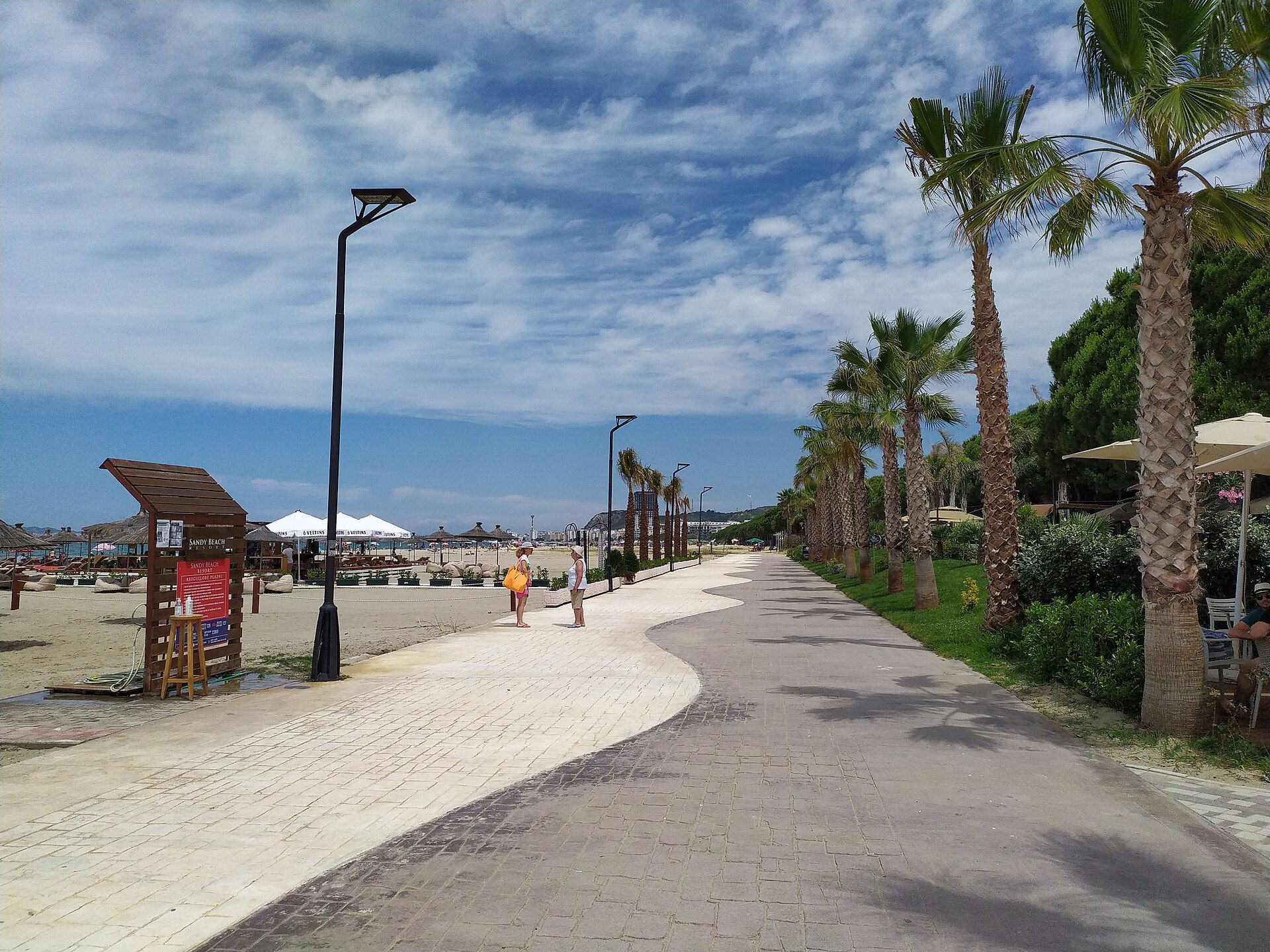 The palm-lined promenade along Golem beach