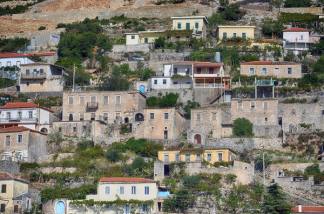 Stone houses on the terraced hillside of Vuno, Himarë, Albania — Pasztilla aka Attila Terbócs