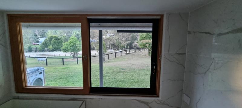 Security screen installation Internal view of sliding security screen for a servery window