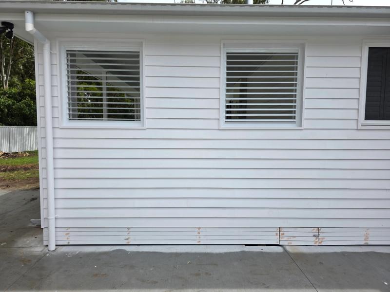 External aluminium shutter close-up showing adjustable louvre detail