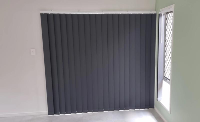 Vertical blind installation Vertical blinds on door in living area