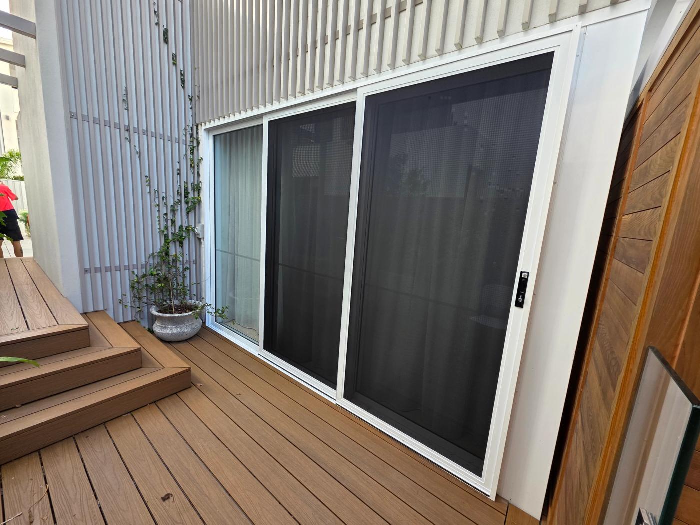 Sliding stacker security screen doors