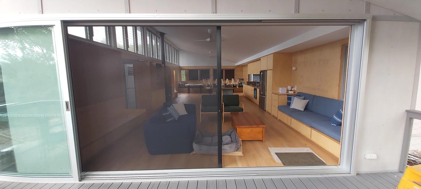 Centor retractable screen on a stacker door