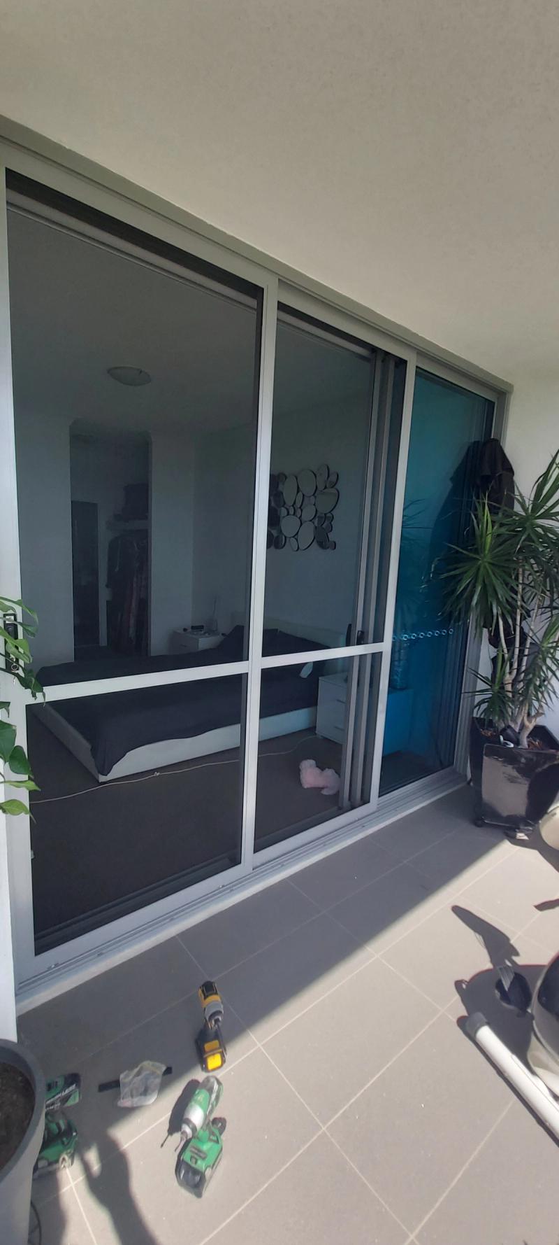 Insect door screen installation Sliding stacker flydoors - bedroom onto balcony