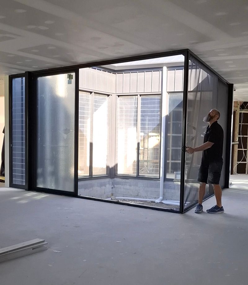 Retractable door screen installation Corner centre opening Zipslide retractable screen