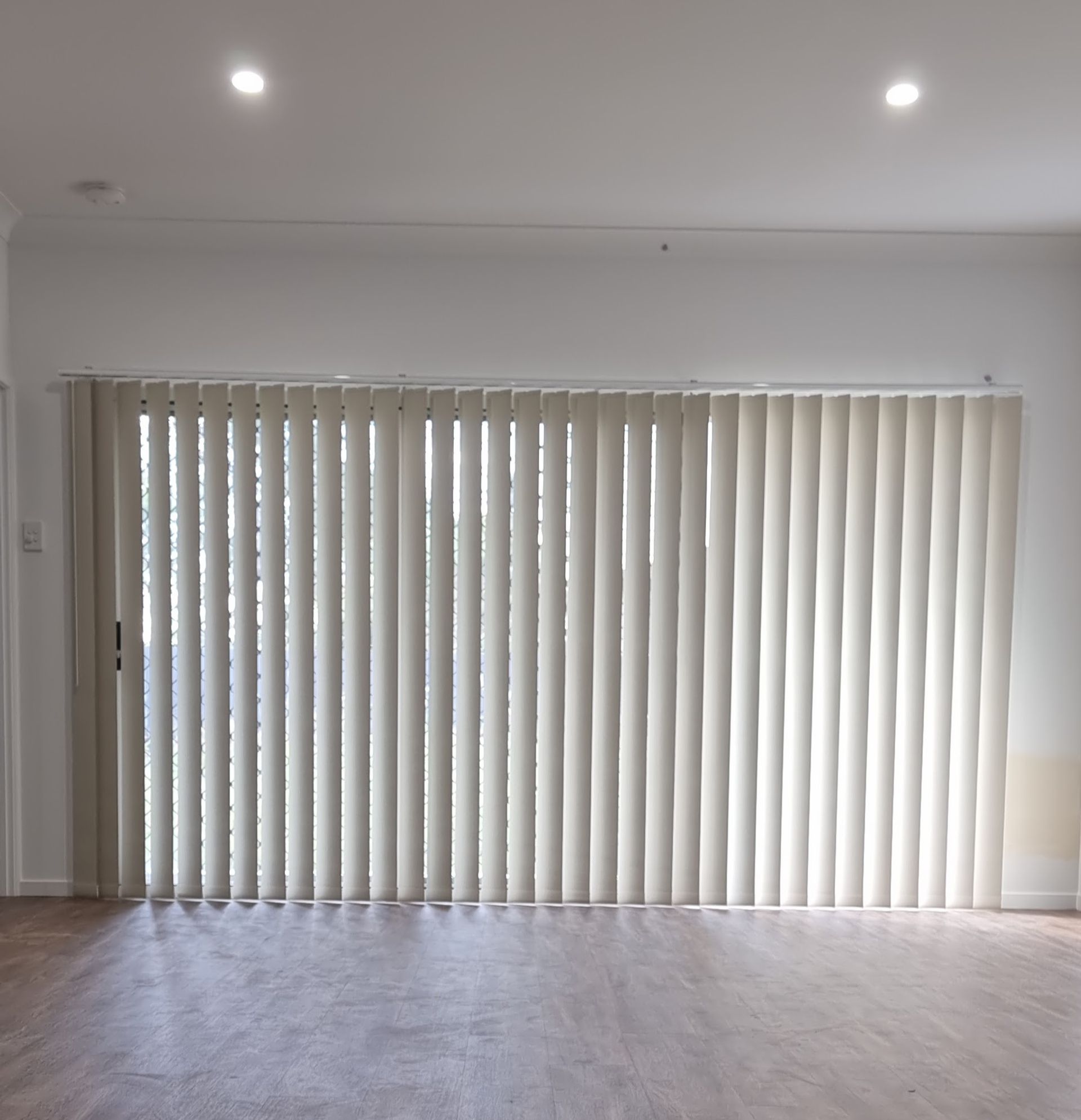Vertical blinds installation on Gold Coast home