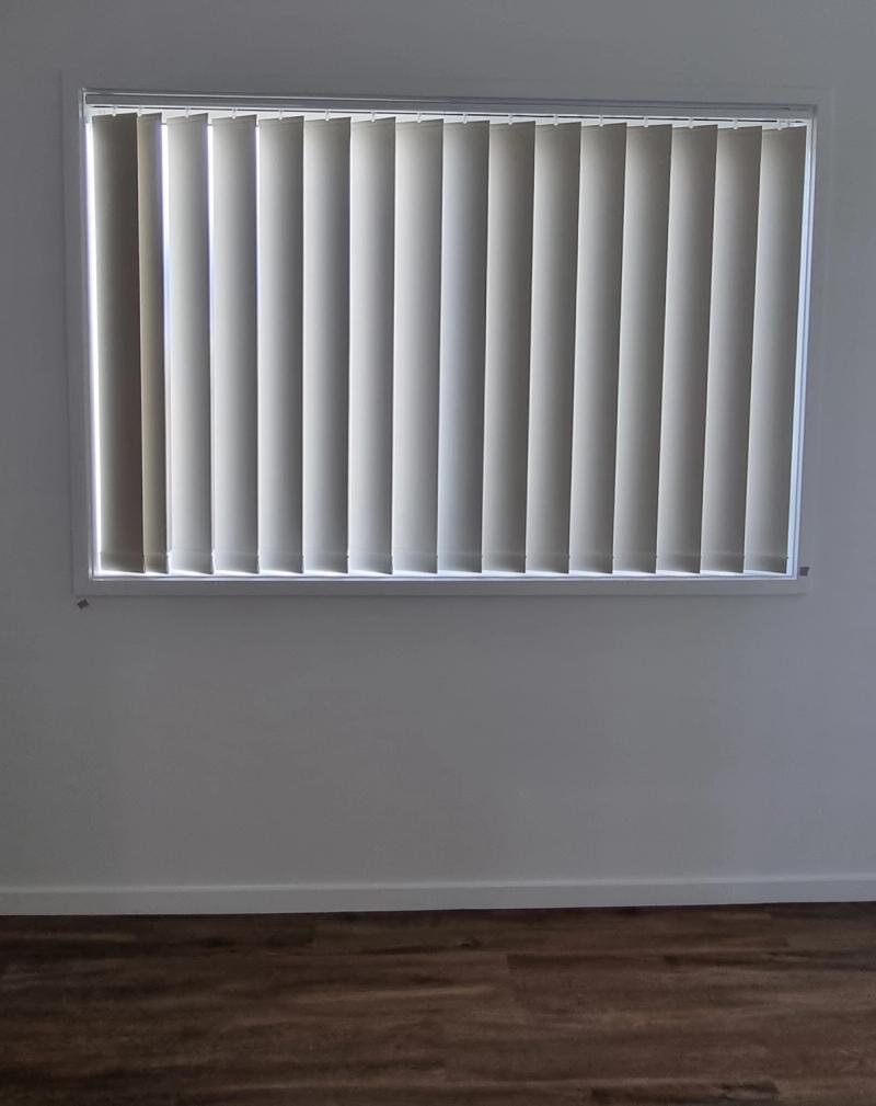 Vertical blind installation Vertical blinds on window in bedroom
