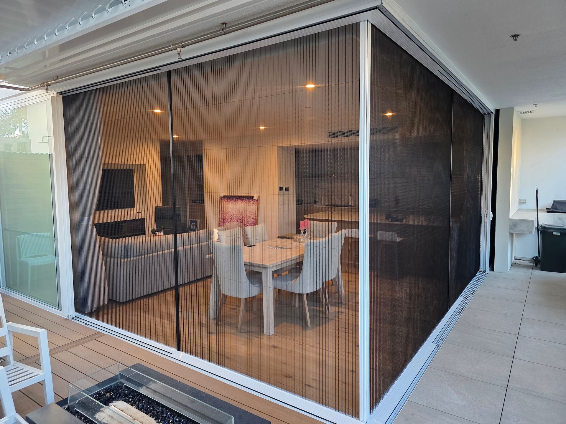 Retractable door screen installation on Gold Coast home