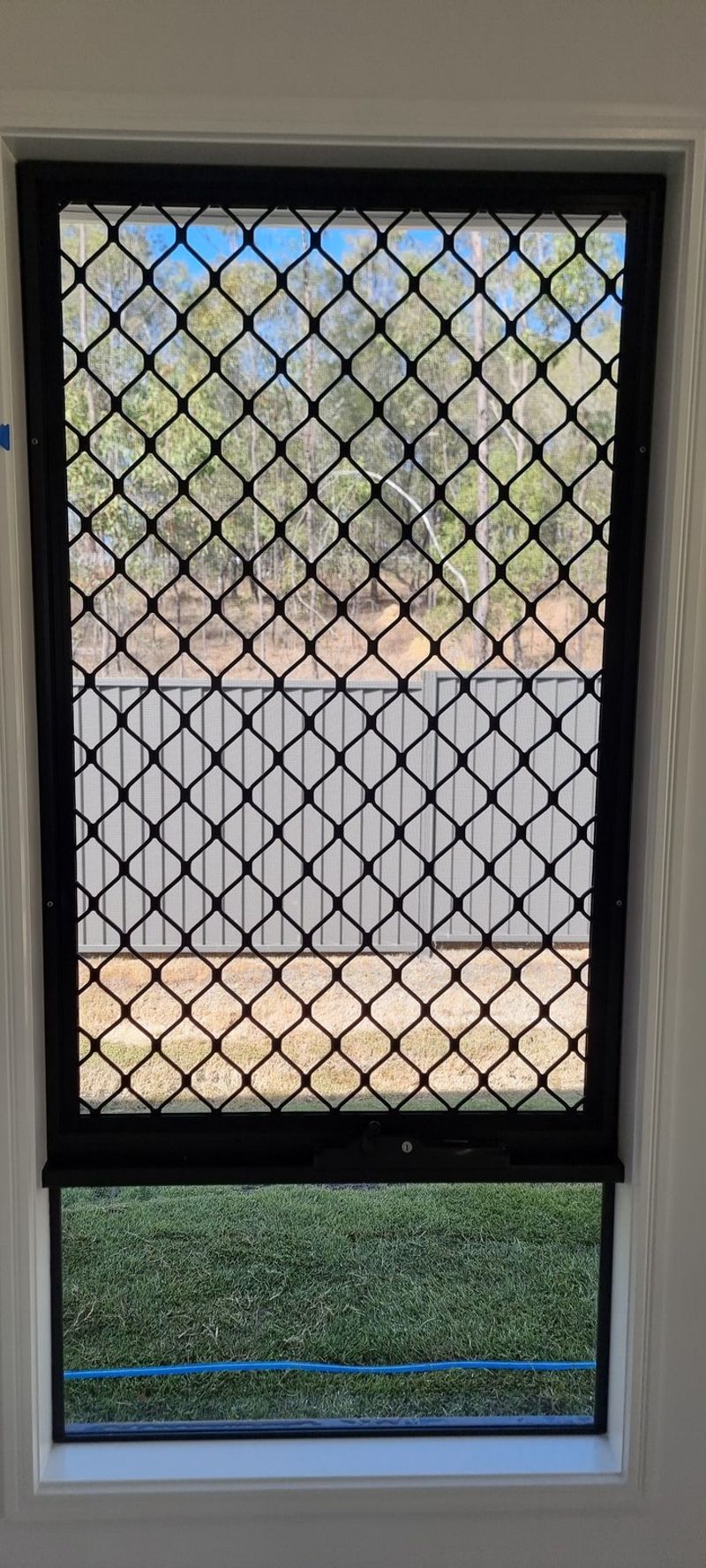 Barrier window screen close-up showing aluminium mesh detail