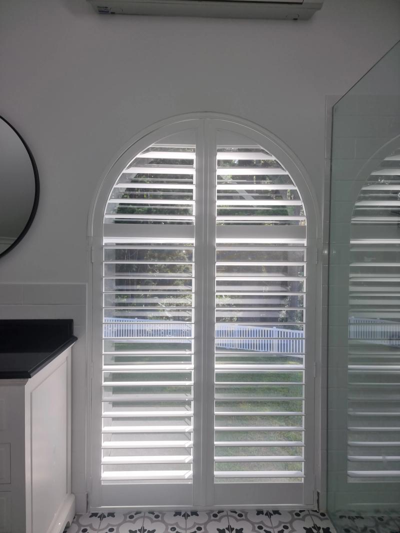 Internal PVC plantation shutter close-up showing adjustable louvres