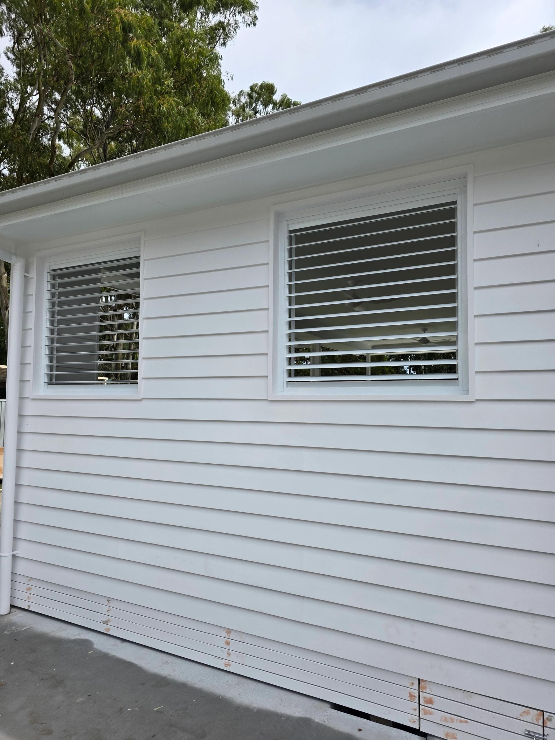 External aluminium shutters installed on Gold Coast home
