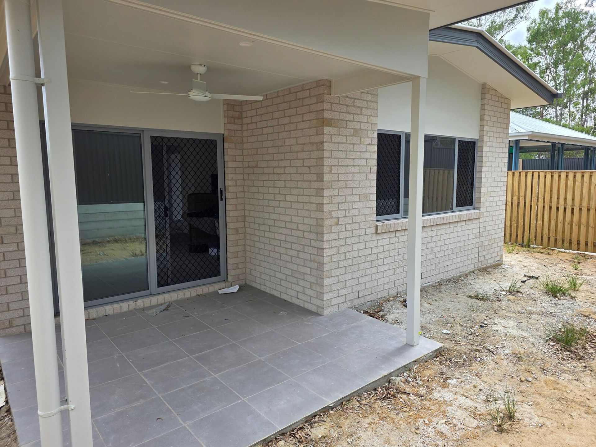 Barrier door screen installation on Gold Coast home