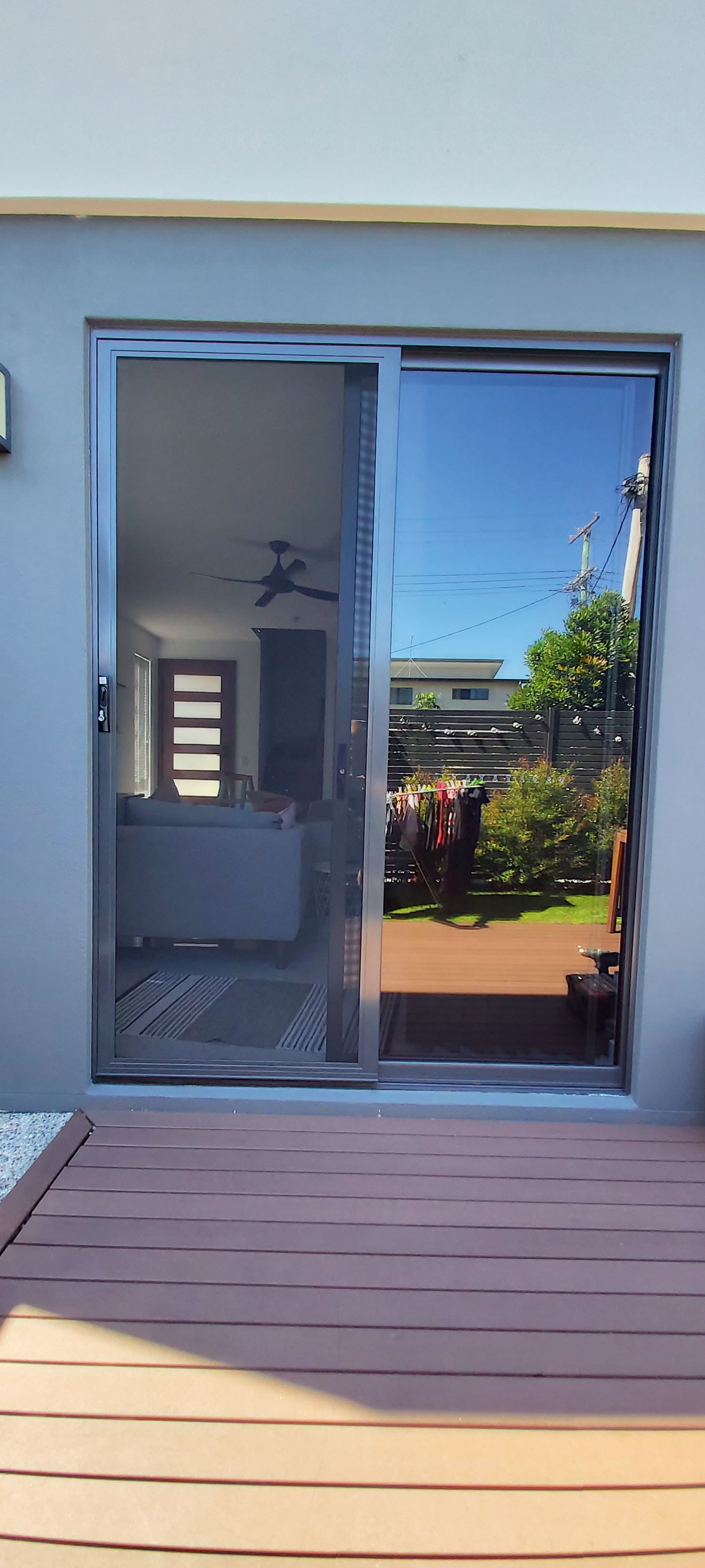 Sliding security screen door with black security mesh