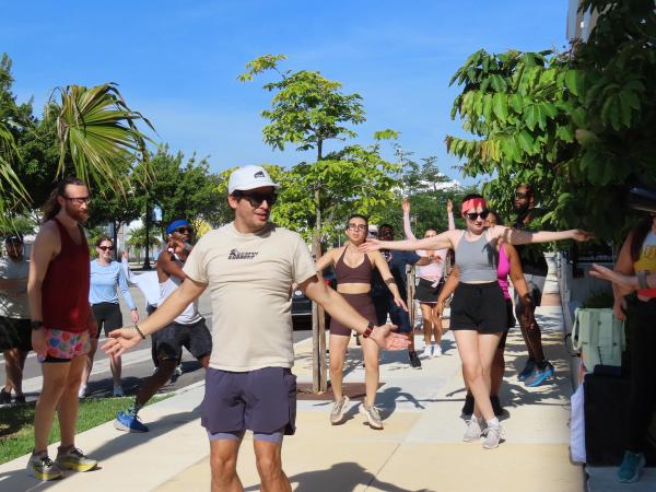 Participants warm up together before the run at Revv Hollywood.