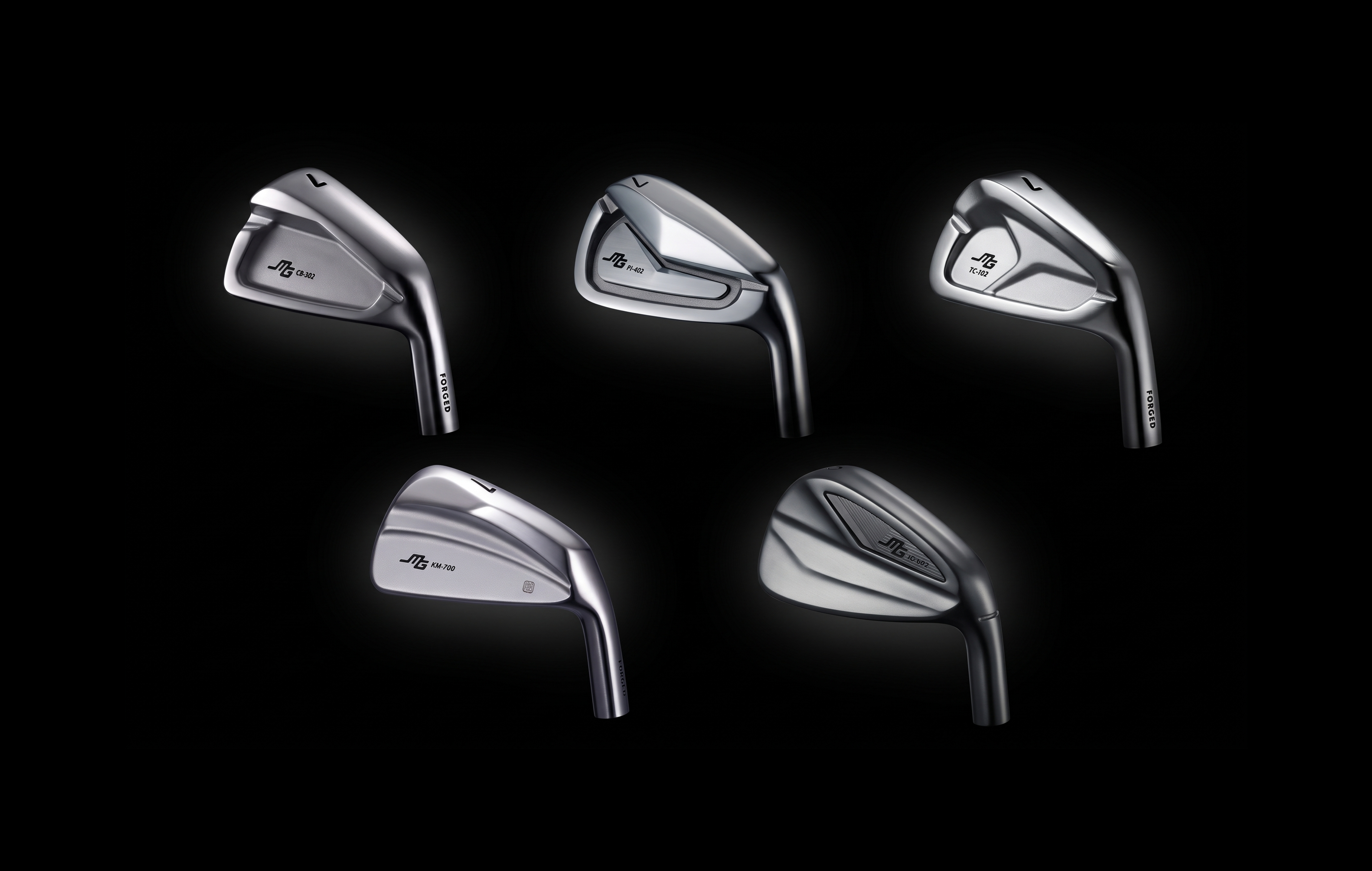 Five Miura forged iron heads on a black background