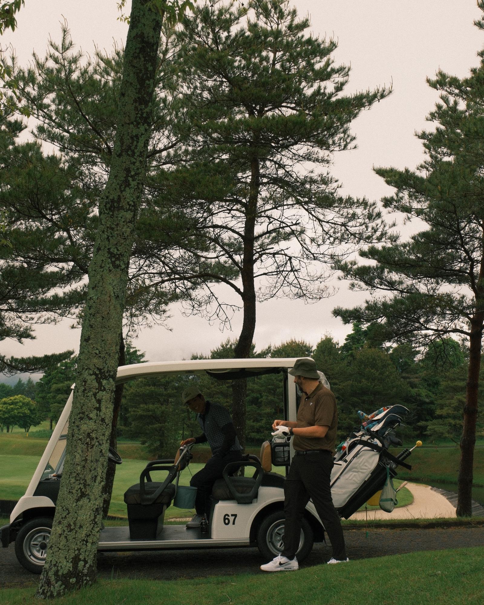 Loading up the cart beneath the pines