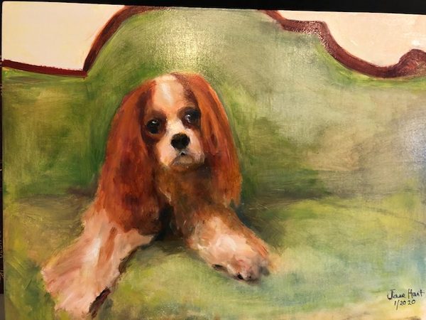 The finished painting of Lily on the easel, signed.
