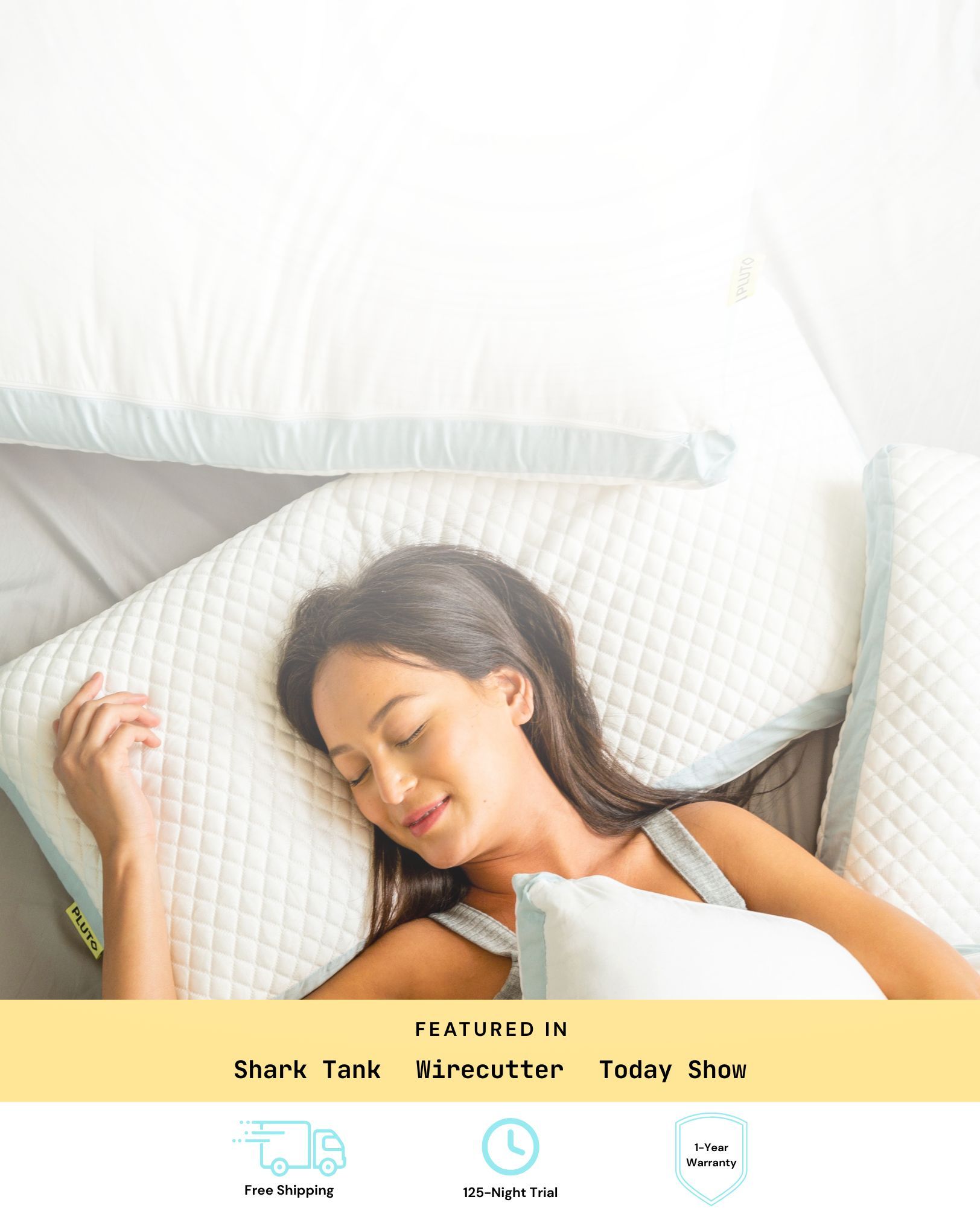 A woman peacefully sleeping on a Pluto pillow.