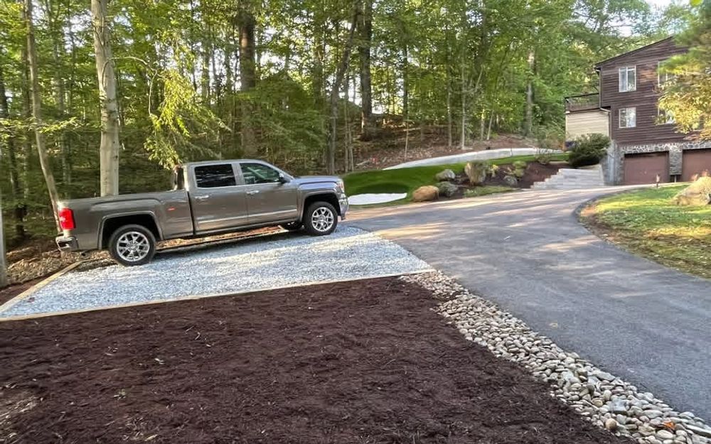 Wooded Driveway Putting Green and Mulch Beds