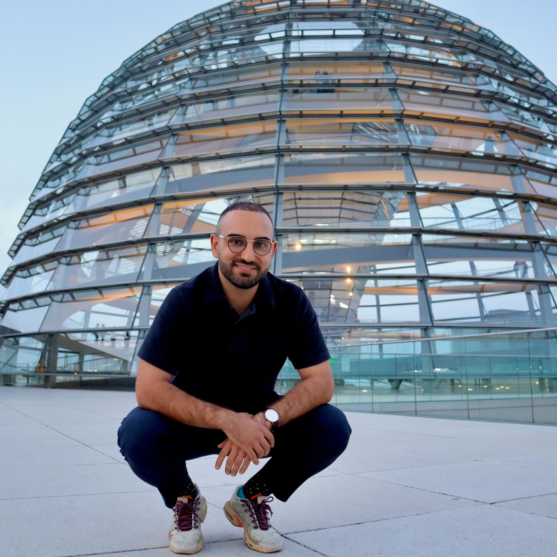 Kassem Taher Saleh in front of the Reichstag dome