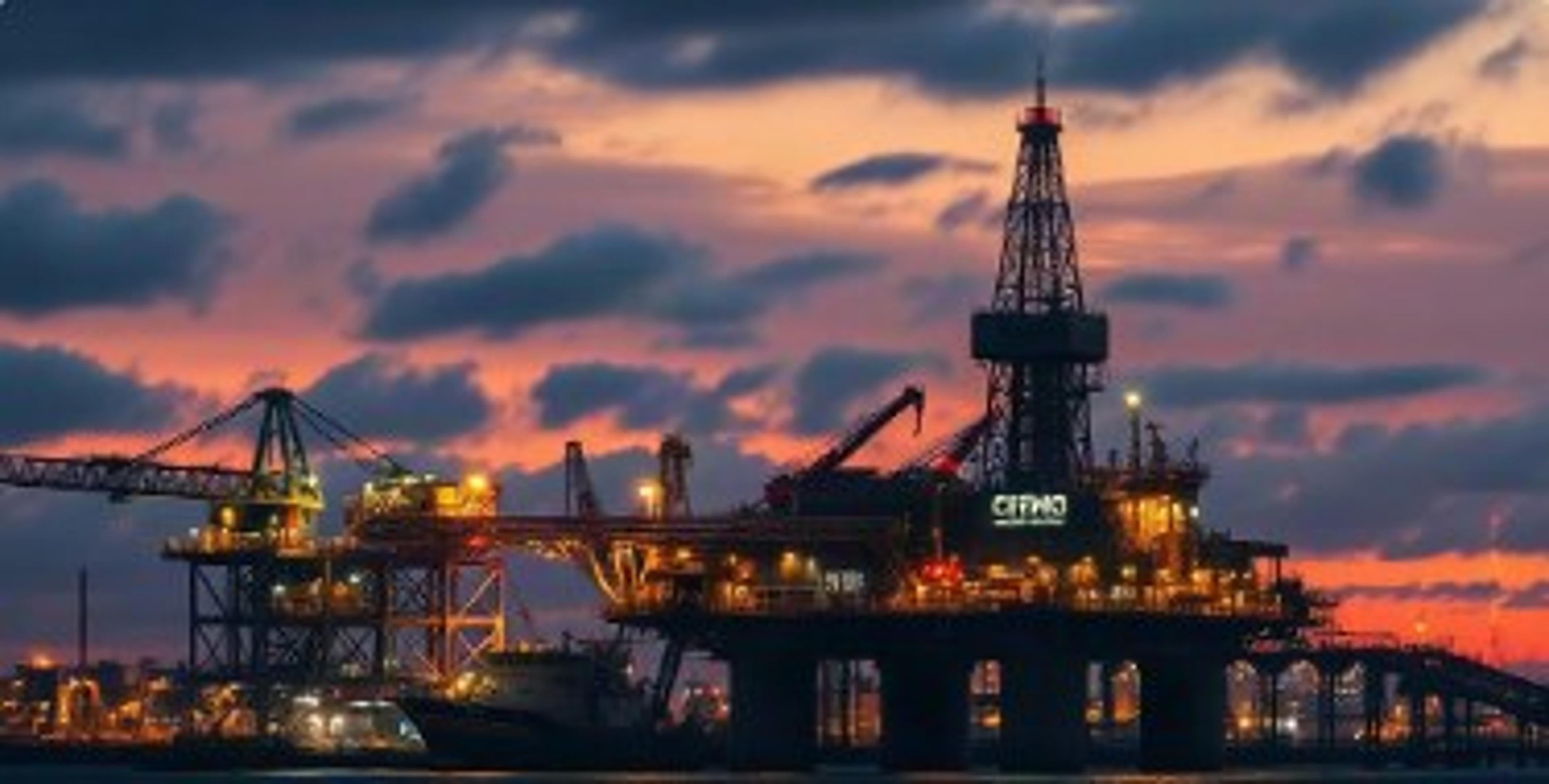 Offshore oil platform at sunset