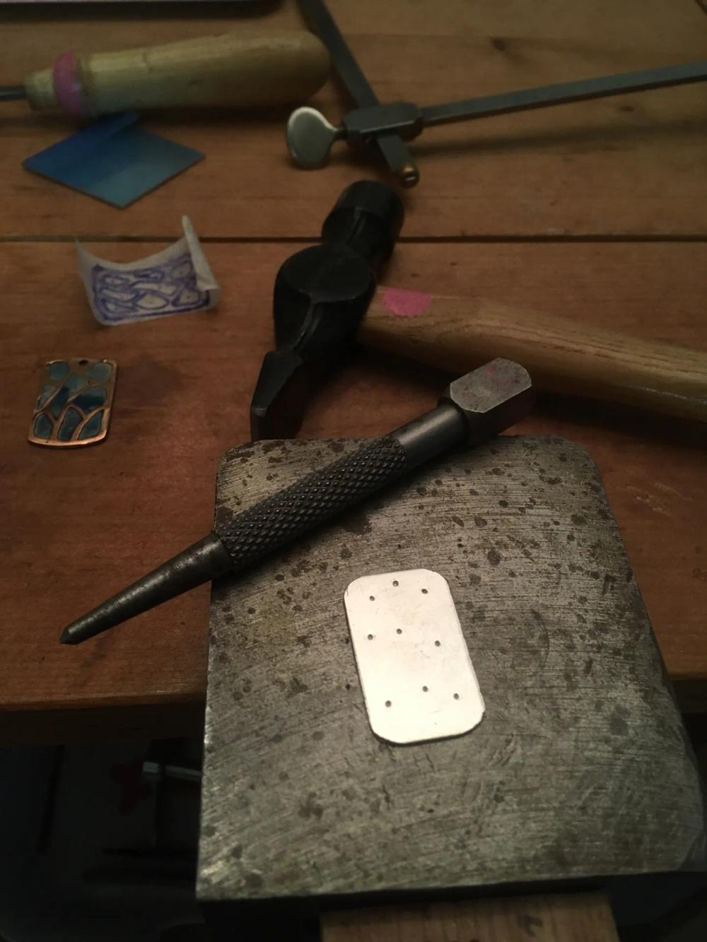 Sterling silver sheet cut out in shape of dog tag