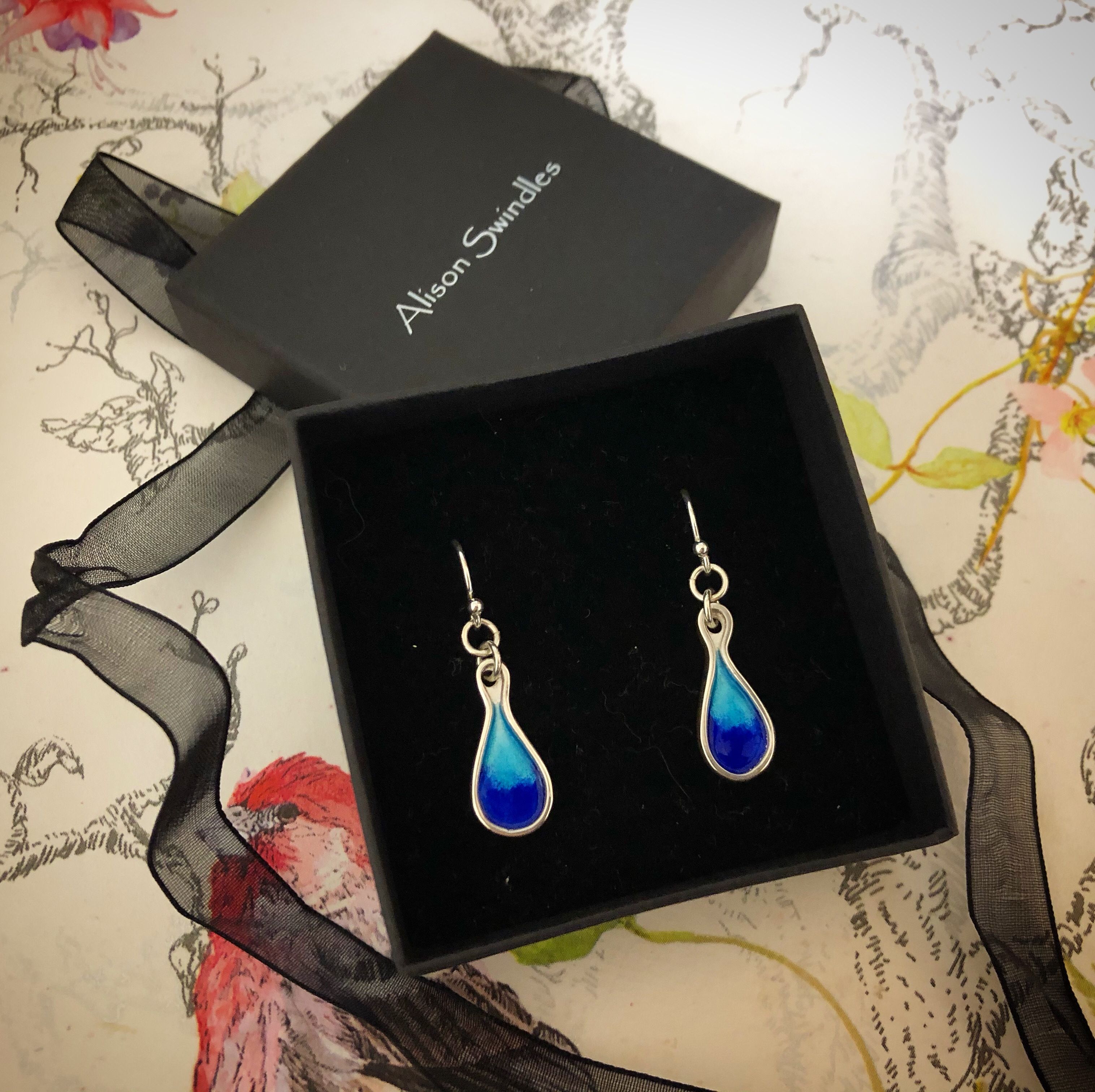 Blue enamelled earrings