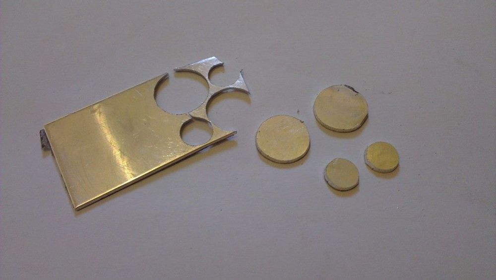 Circles cut from silver flat sheet