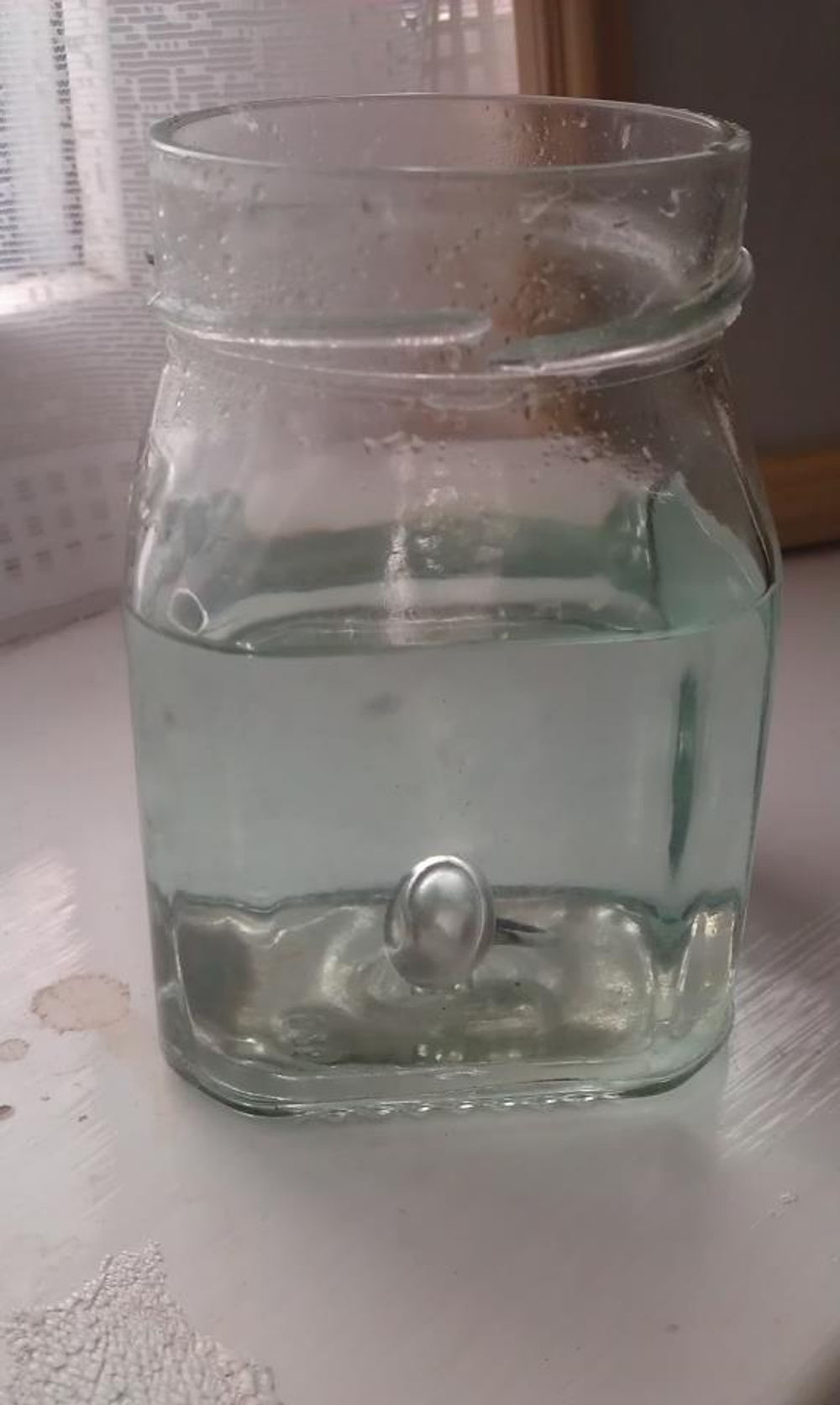 Ring in jar filled with safety pickle
