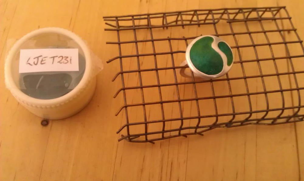 The ring again with an additional layer of enamel powder on top