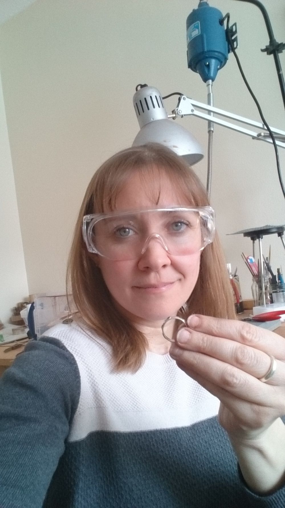 Polishing the ring whilst wearing safety goggles