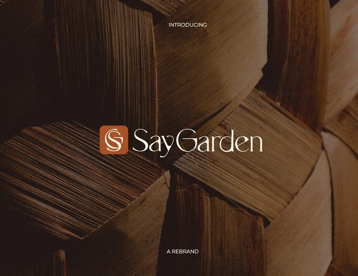 Say Garden logo on a wood texture