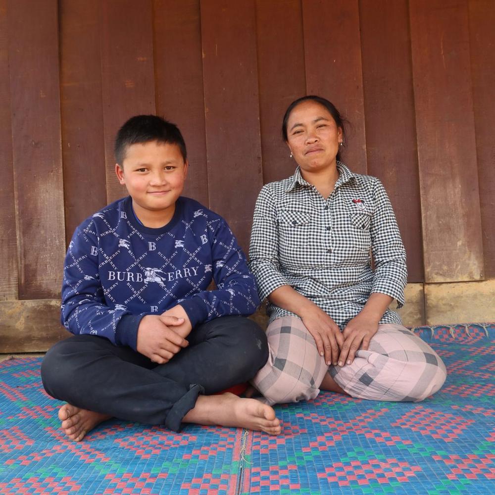  Kankham, age 12, and his mother Khonejai (pictured above) used to walk two hours every day to collect water from a river far from their remote village in  Houaphanh Province. A newly built clean water system in their community means Kankham has more time to learn and play. 