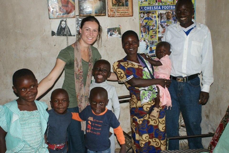Lauren with Michael (in grey shirt) and his family, in Kenya in 2012. Meeting Michael and his family was "one of the best days of my life," says Lauren.