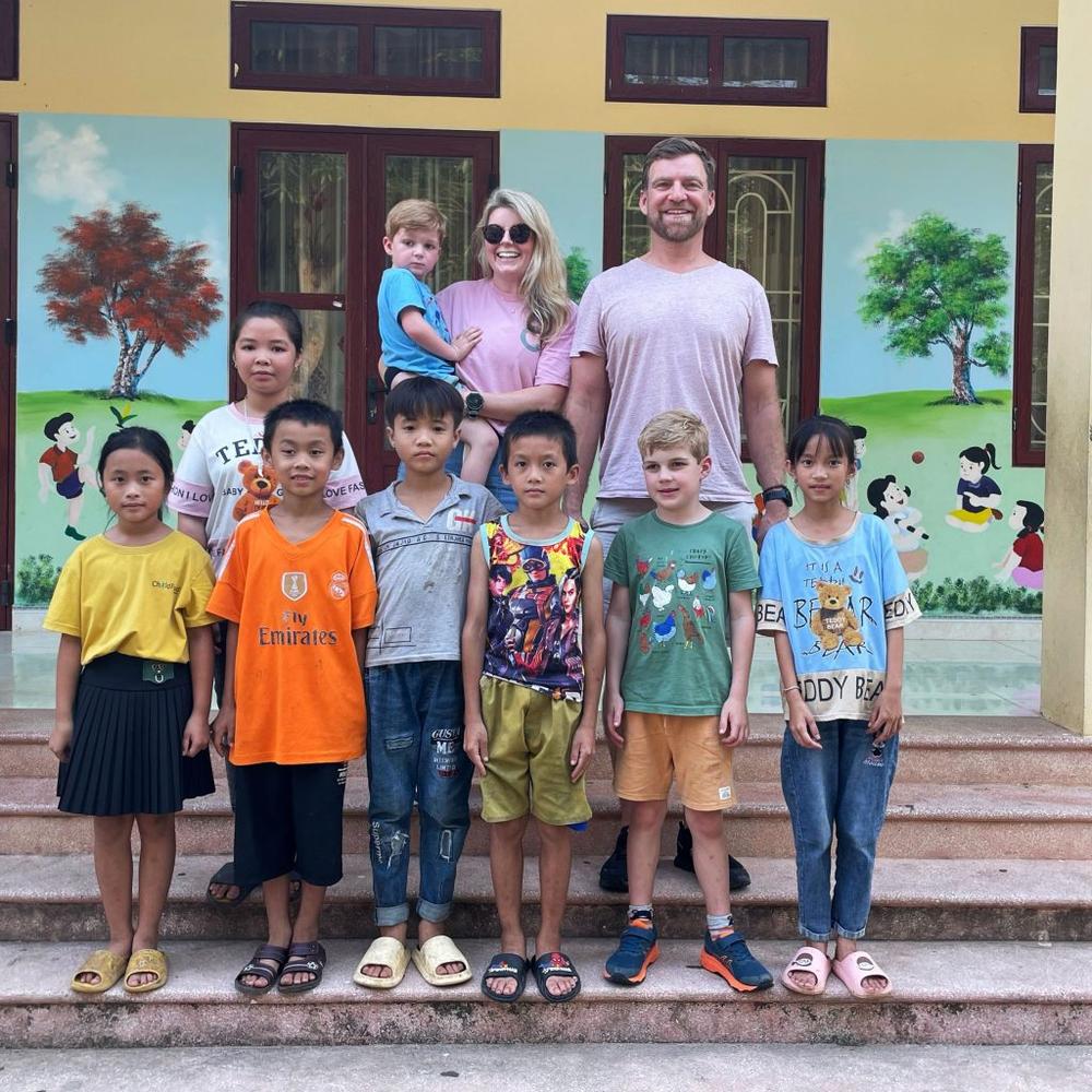 Chris and his partner Natalie, and sons Harry, age 7, and Jamie, age 4, visiting a ChildFund-supported primary school in rural Vietnam.