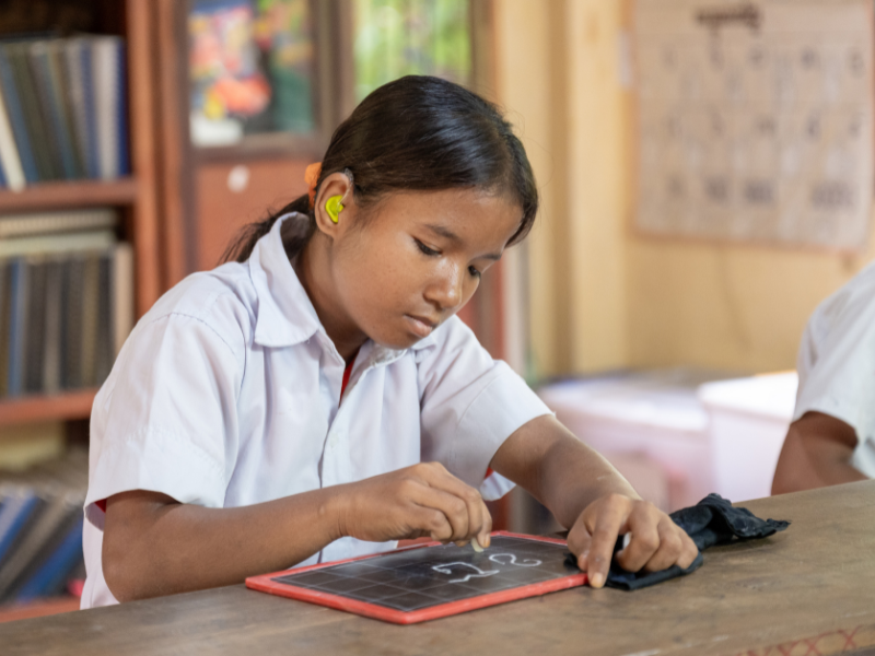 Srey Oun is no longer simply copying from the board. At her DEEP-supported school, she can understand the lesson, ask questions and take part in her learning.