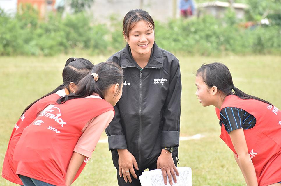 Hien coaching her team