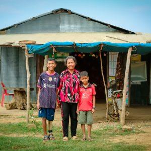 Seila pictured with his mother and younger brother.