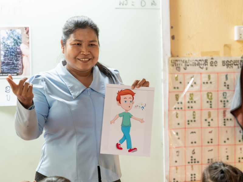 Rem Rina, Srey Oun’s teacher, helps make learning more accessible in the classroom.
