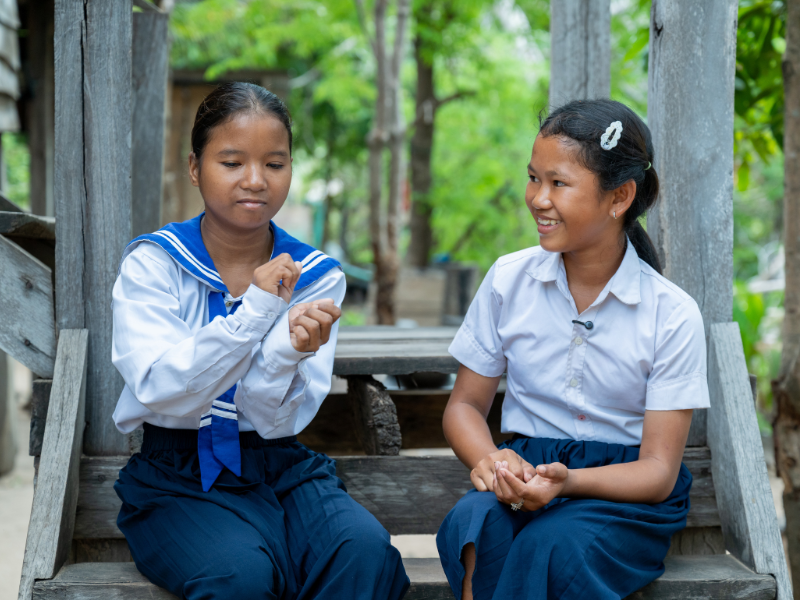 Srey Oun has made new friends at her school, including children who are learning sign language to communicate with her.