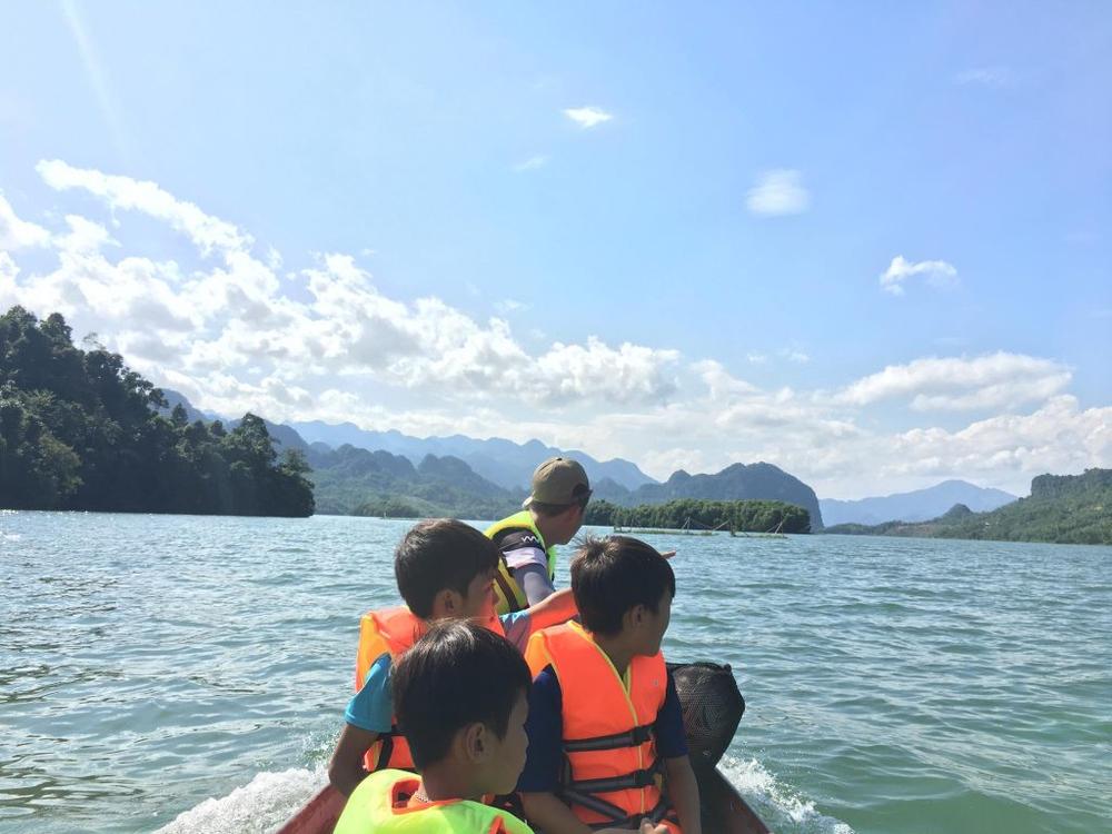 People on boat wearing life vests