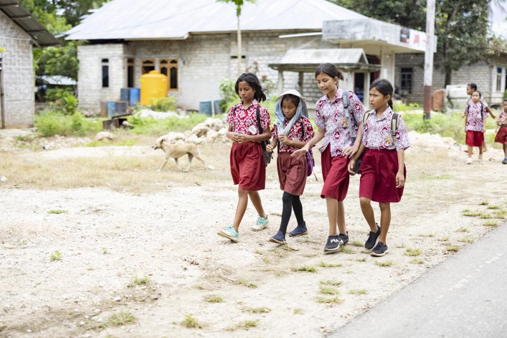 Children walking to school in Indonesia. 