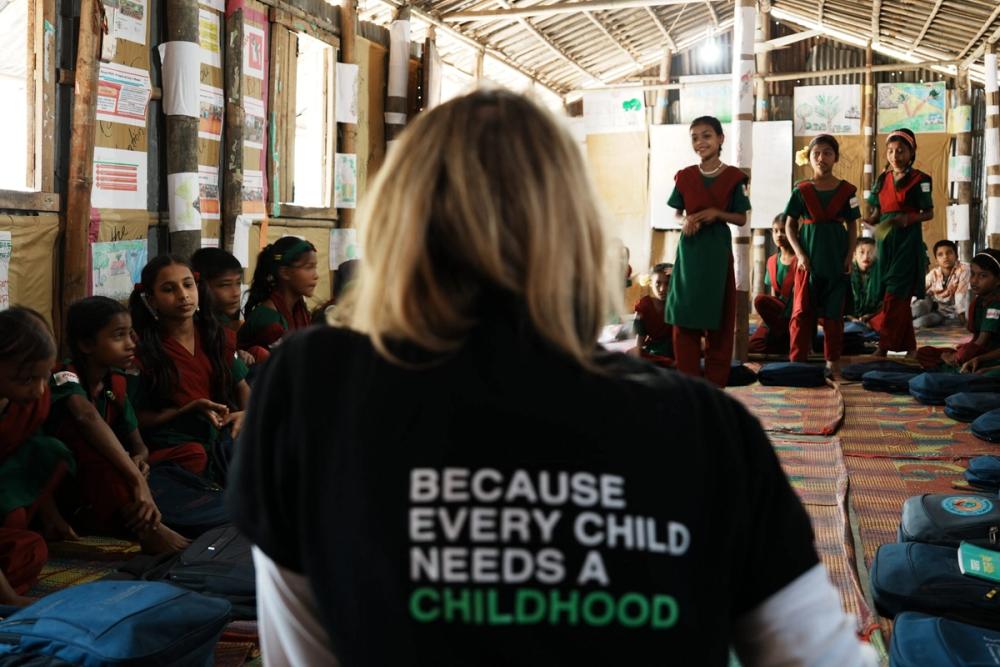  ChildFund Australia’s Chief Development Officer, Corinne Habel, pictured above, hears from girls about their dreams for the future in Kutupalong refugee camp. (ChildFund Australia) Source: ChildFund Australia